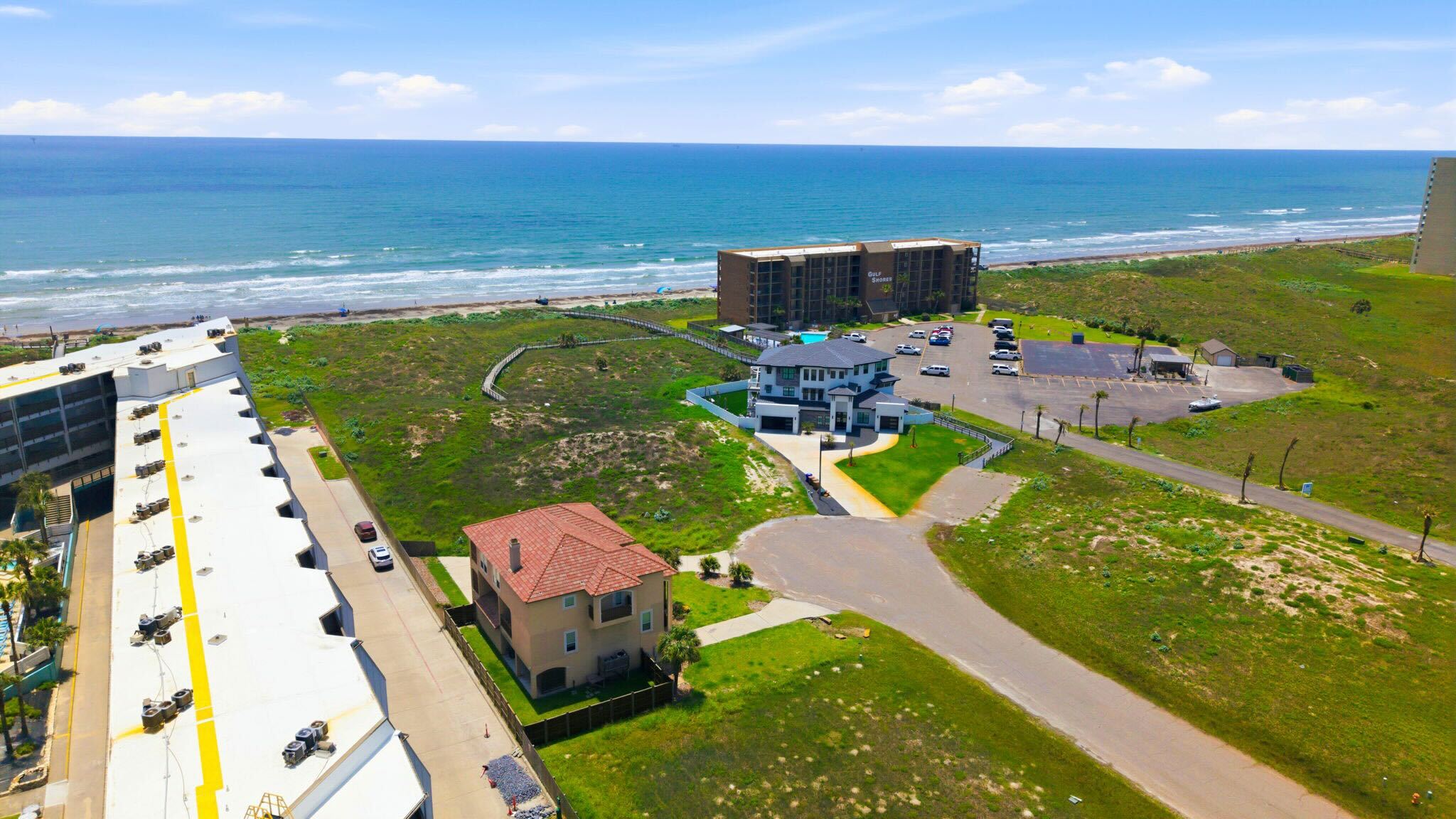 Aerial View — Beachfront Mediterranean Home with Ocean & Dunes